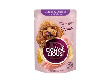 Delickcious™ „Juostelės su kalakutiena ir sūriu kreminėje sriuboje” visavertis konservuotas pašaras suaugusiems šunims, 85 gr