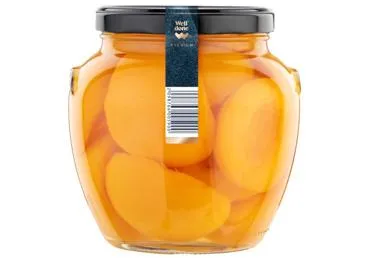Konservētas mizotas persiku pusītes sīrupā WELL DONE PREMIUM 1,65kg