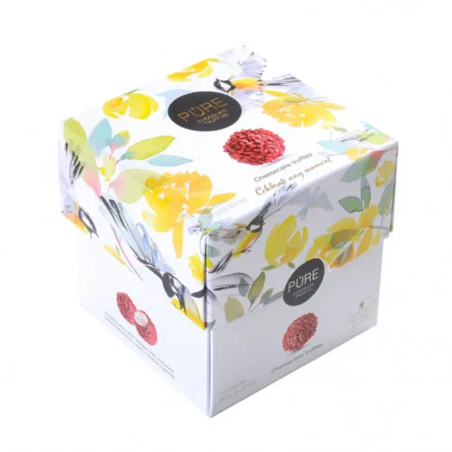 Piena šokolādes trifeles ar siera kūkas krēma pildījumu un dekoru 12 PAVASARIS 96g, PURE CHOCOLATE