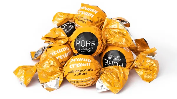 Piena šokolādes trifeles ar zemesriekstu krēma pildījumu 1kg, PURE